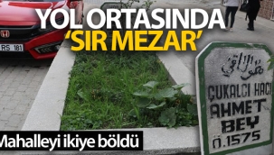 Yol ortas?nda 's?r mezar' mahalleliyi ikiye bld