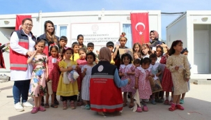 Bayraml?k hediyeler 12 bin ocu?umuza ula?t?